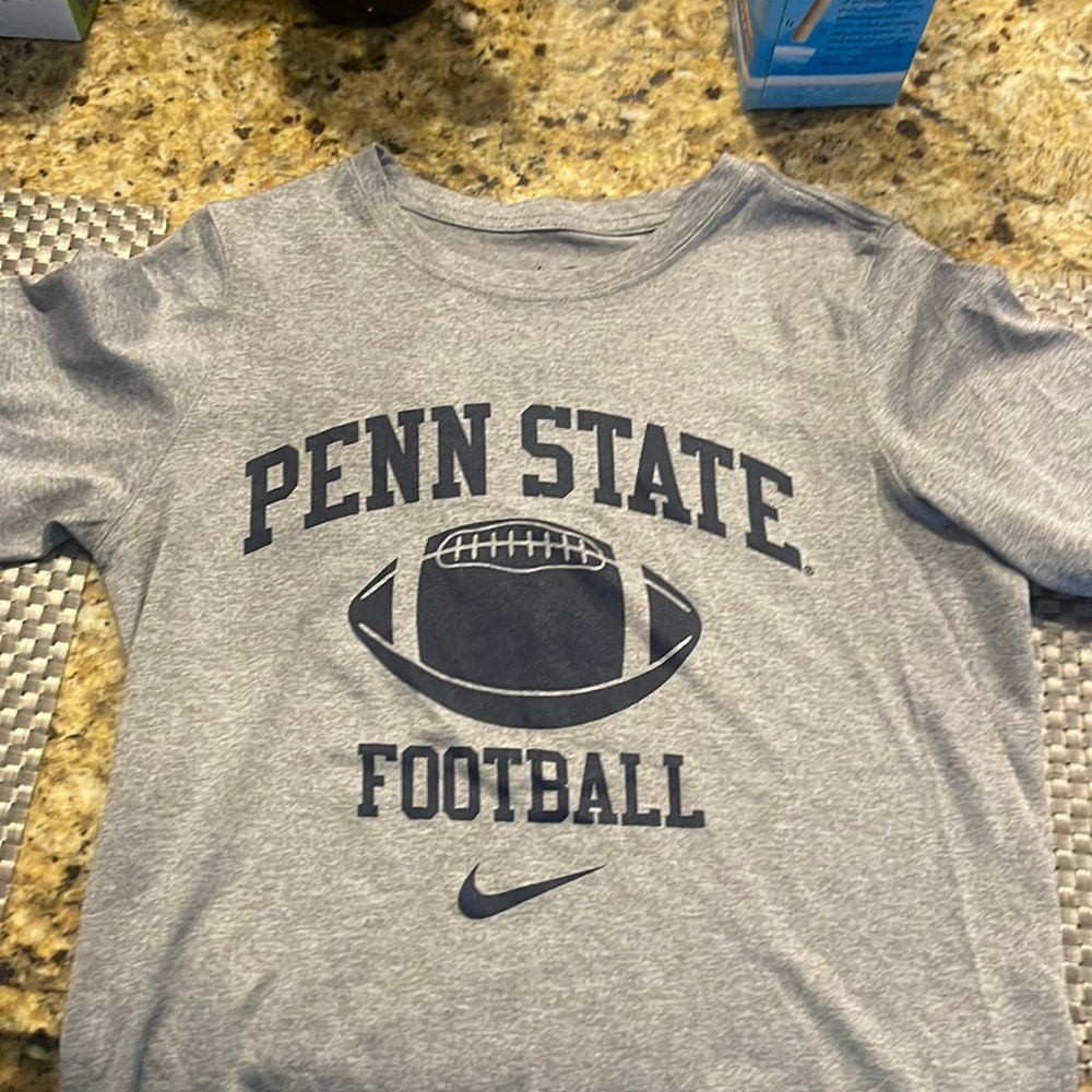 NIKE penn state baby tee, fits longer, but is fitted and a soft material